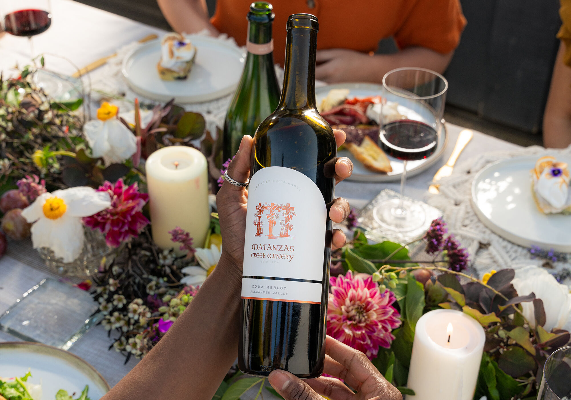 Matanzas Creek Merlot Wine bottles and glasses of wine